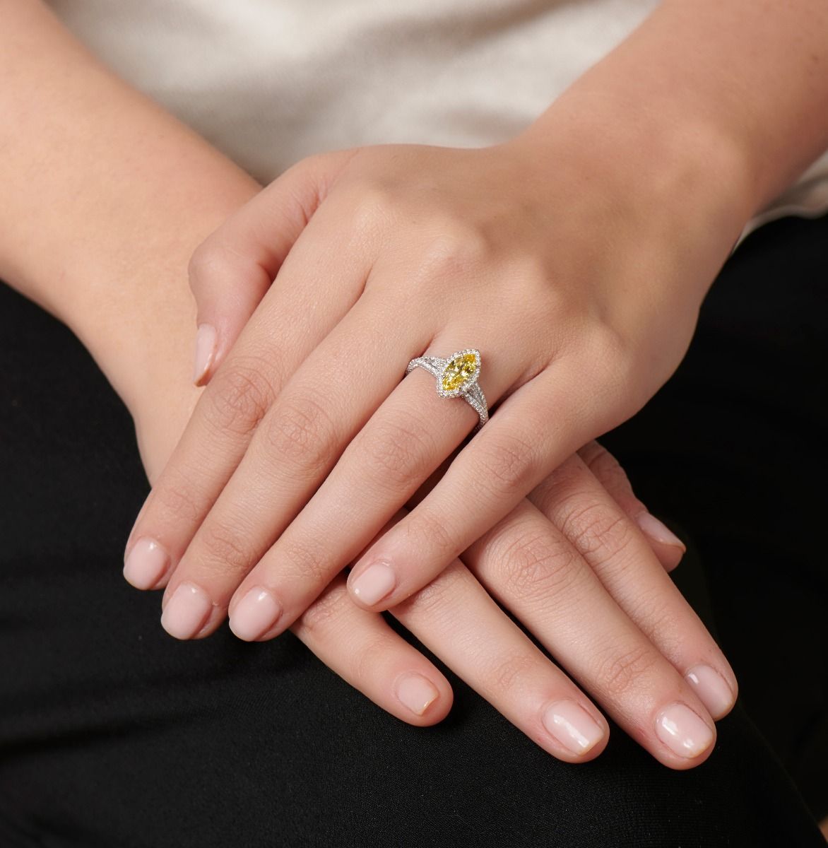 FANCY VIVID YELLOW DIAMOND, PLATINUM RING