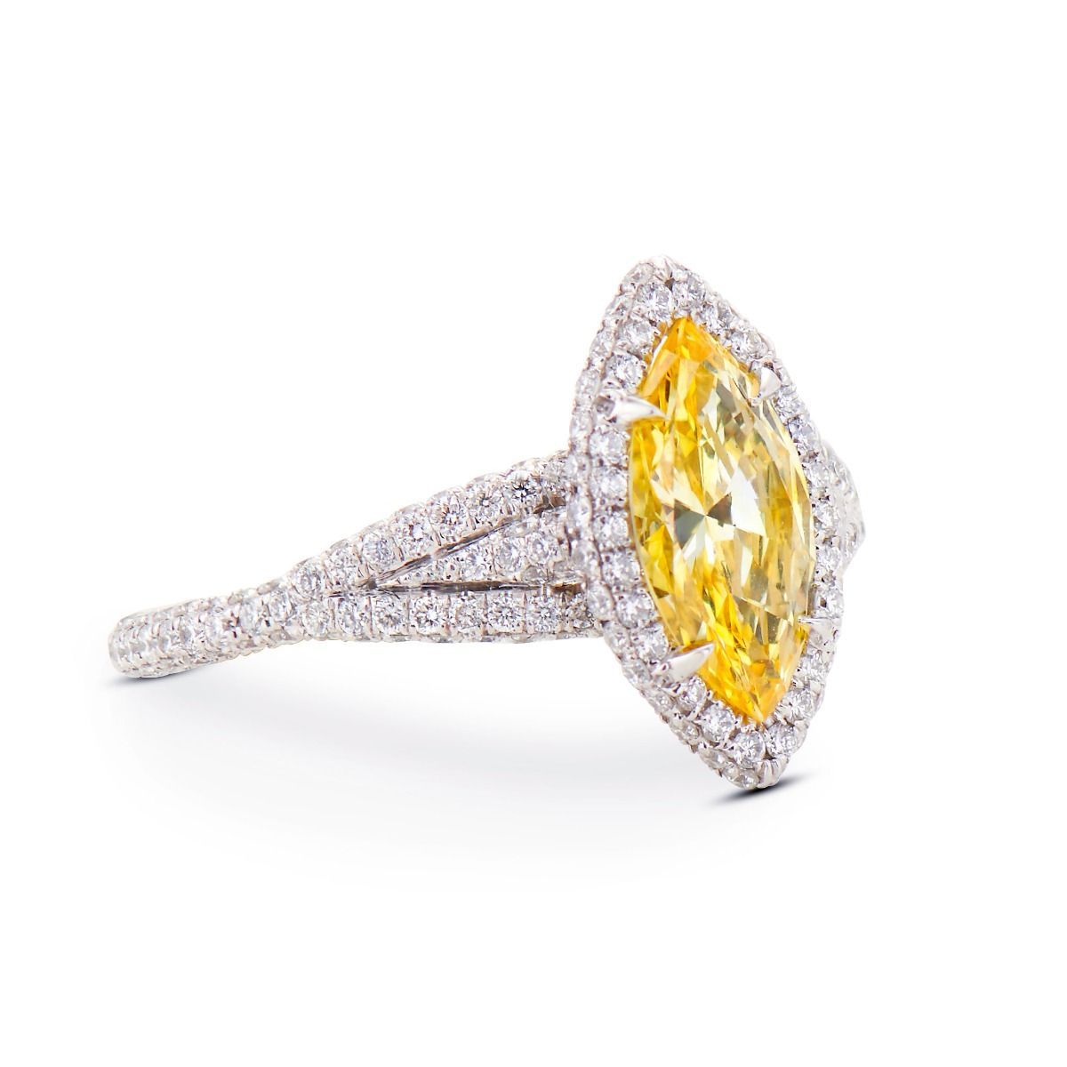 FANCY VIVID YELLOW DIAMOND, PLATINUM RING