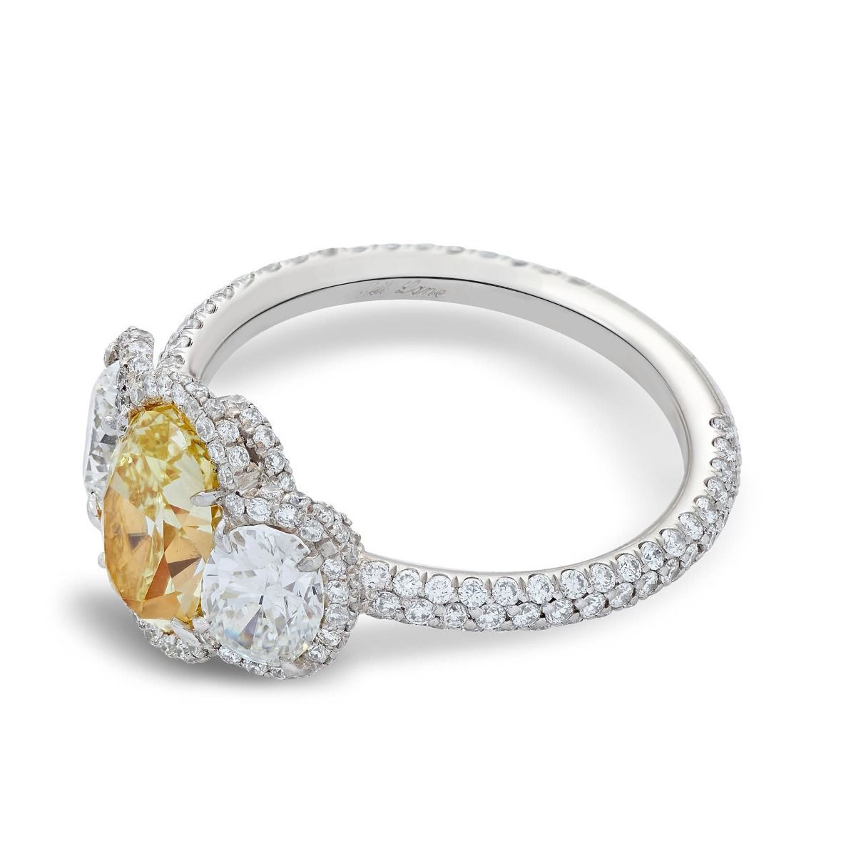 YELLOW & WHITE DIAMOND THREE STONE PLATINUM RING