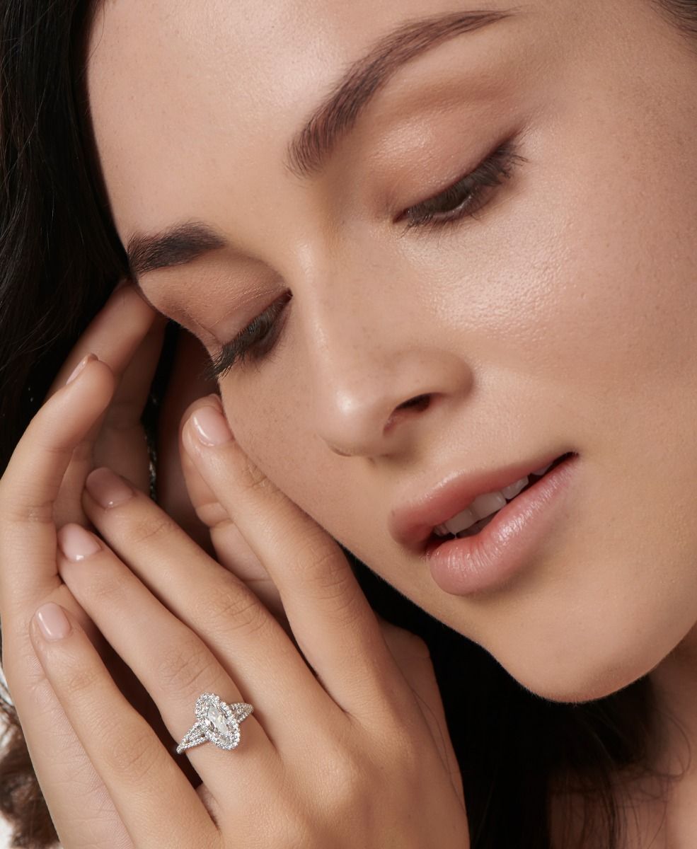 MOVAL-SHAPED DIAMOND AND PLATINUM ENGAGEMENT RING